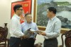 Secretary of the provincial Party Committee, Comrade Huynh Tan Viet working with investors